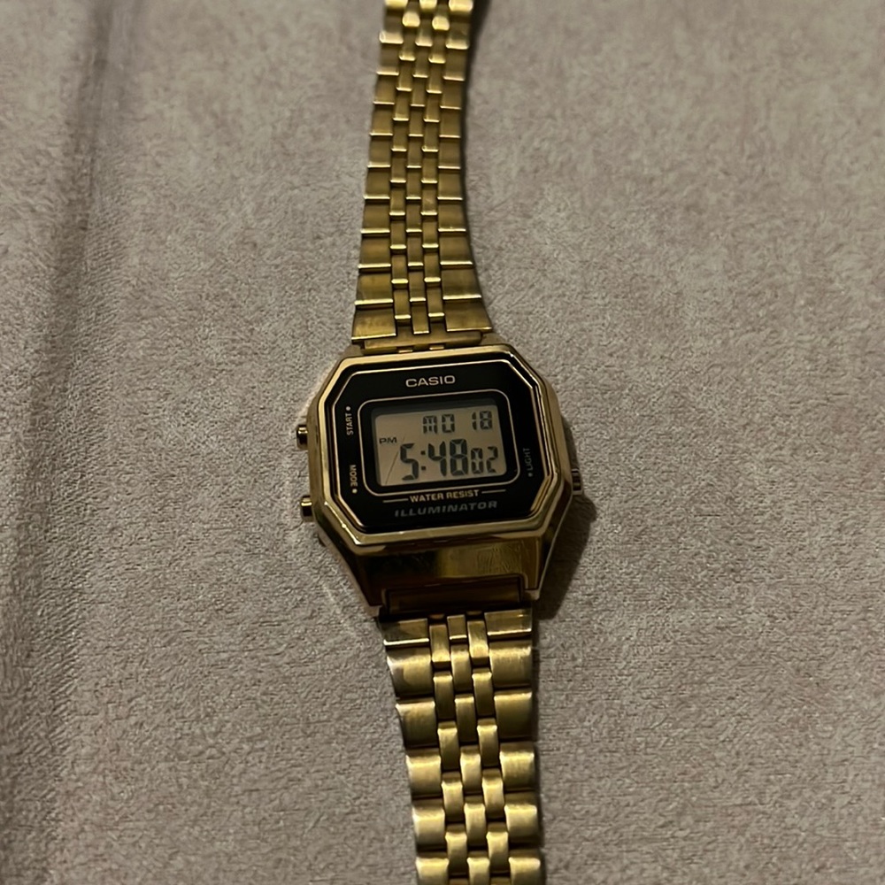 Casio gold tone mini digital “Illuminator” watch